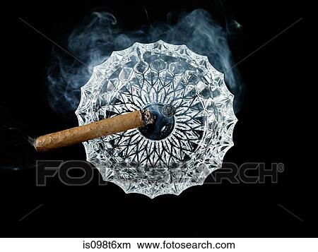 Cigar in ashtray View Large Photo Image Picture - Cigar in ashtray. Fotosearch