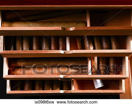 Cigars in box View Large Photo Image Stock Photo - Cigars in box. Fotosearch
