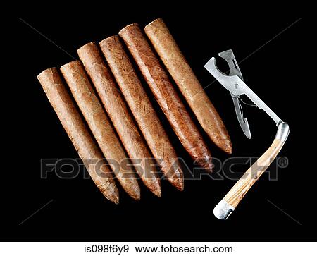 Cigars with cutter View Large Photo Image Stock Photo - Cigars with cutter. Fotosearch