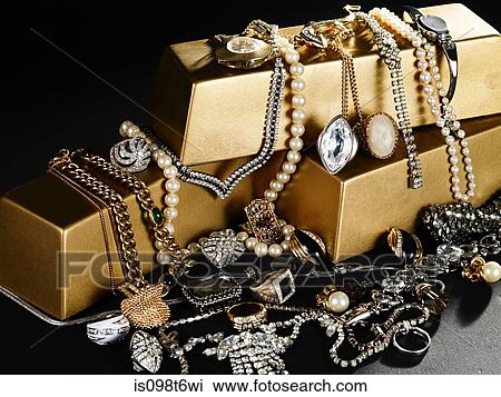 Jewelry and gold bars View Large Photo Image Stock Image - Jewelry and gold bars. Fotosearch
