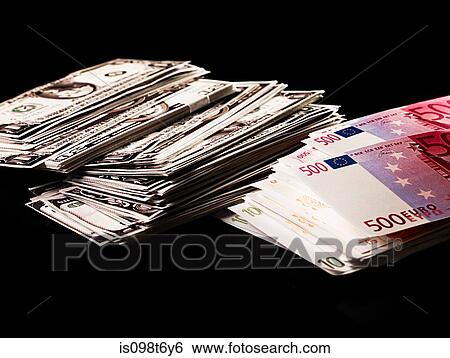 Stacks of dollars and euro banknotes View Large Photo Image Stock Photograph - Stacks of dollars and euro banknotes. Fotosearch