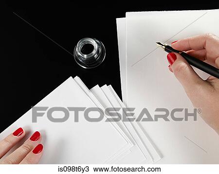 Woman writing with ink pen View Large Photo Image Stock Image - Woman writing with ink pen. Fotosearch