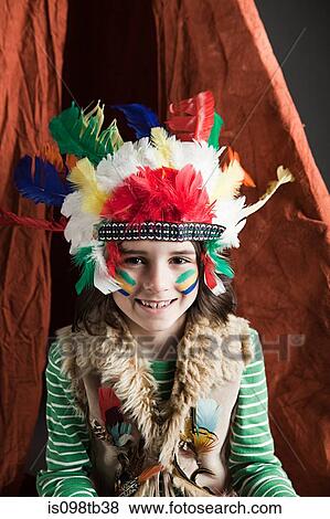 Young boy dressed up in Native American outfit, with teepee View Large Photo Image Stock Photo - Young boy dressed up in Native American outfit, with teepee. Fotosearch