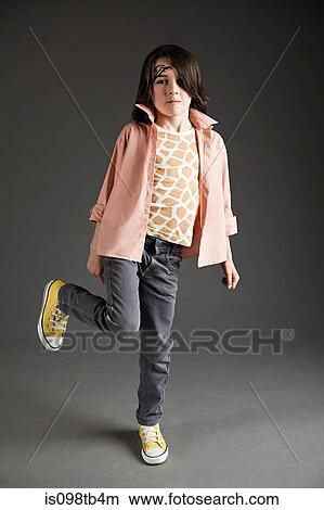 Young boy wearing casual clothes and face paint View Large Photo Image Picture - Young boy wearing casual clothes and face paint. Fotosearch