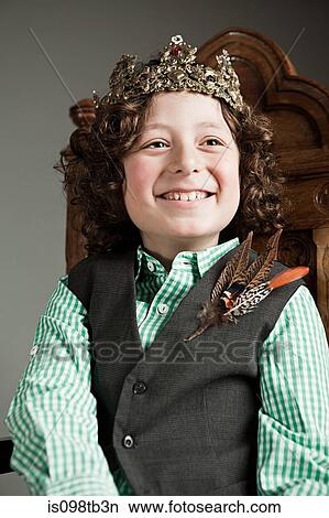 Young boy wearing gold crown View Large Photo Image Picture - Young boy wearing gold crown. Fotosearch