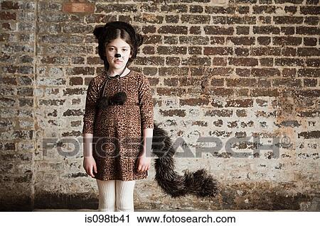 Young girl dressed up as cat View Large Photo Image Stock Image - Young girl dressed up as cat. Fotosearch