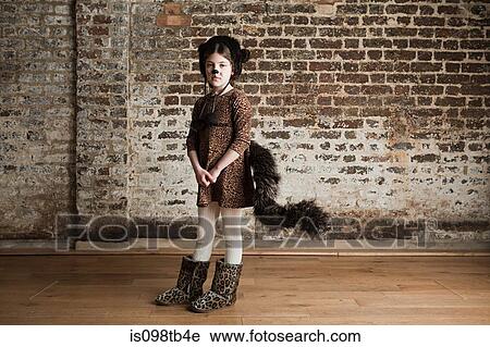 Young girl dressed up as cat View Large Photo Image Stock Image - Young girl dressed up as cat. Fotosearch