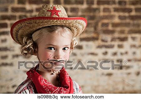 Young girl dressed up as cowgirl View Large Photo Image Stock Photography - Young girl dressed up as cowgirl. Fotosearch