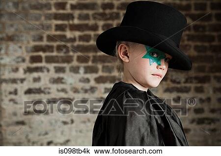 Young girl dressed up as magician wearing top hat View Large Photo Image Stock Image - Young girl dressed up as magician wearing top hat. Fotosearch