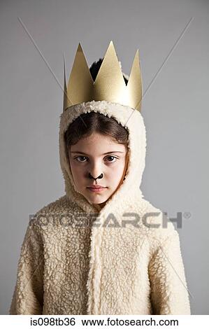 Young girl dressed up as sheep, wearing gold crown View Large Photo Image Stock Photograph - Young girl dressed up as sheep, wearing gold crown. Fotosearch