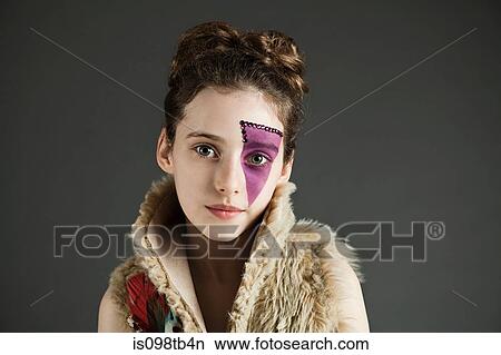 Young girl wearing purple face paint View Large Photo Image Picture - Young girl wearing purple face paint. Fotosearch