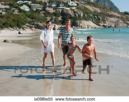 Family on a beach View Large Photo Image Stock Photography - Family on a beach. Fotosearch
