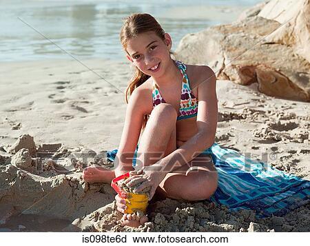 Girl on a beach View Large Photo Image Stock Image - Girl on a beach. Fotosearch