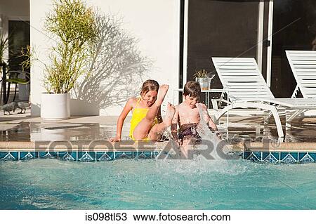 Family and outdoor swimming pool View Large Photo Image Stock Image - Family and outdoor swimming pool. Fotosearch