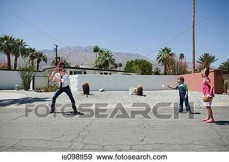 Father playing ball with son and daughter View Large Photo Image Stock Photo - Father playing ball with son and daughter. Fotosearch