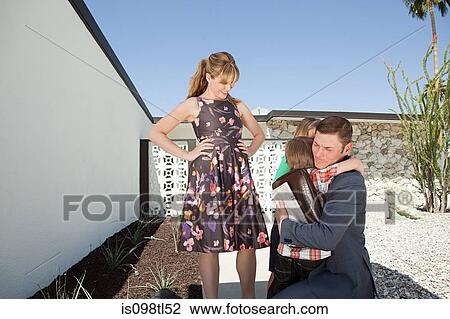 Father saying goodbye to family View Large Photo Image Stock Image - Father saying goodbye to family. Fotosearch