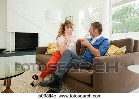 Retro couple inside home View Large Photo Image Stock Image - Retro couple inside home. Fotosearch