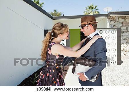 Retro couple outside home View Large Photo Image Stock Image - Retro couple outside home. Fotosearch