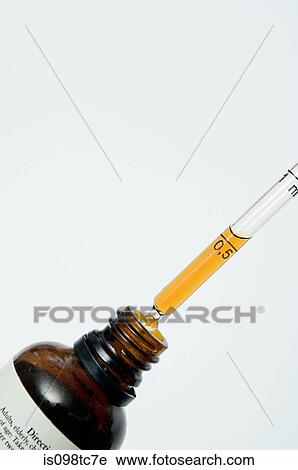 Bottle and pipette of liquid View Large Photo Image Stock Image - Bottle and pipette of liquid. Fotosearch