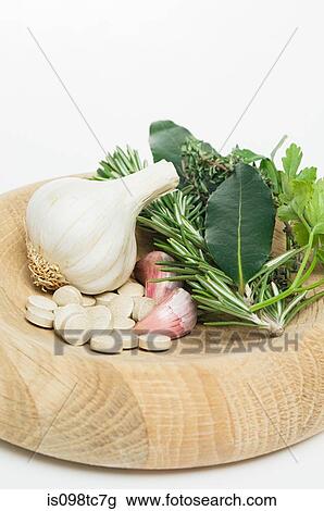 Garlic herbs and tablets View Large Photo Image Stock Image - Garlic herbs and tablets. Fotosearch