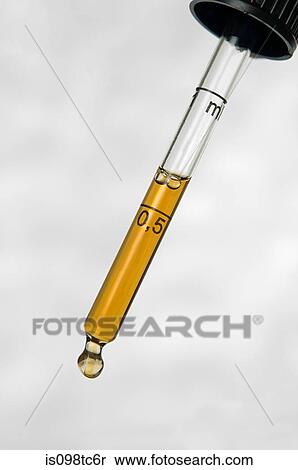Stock Photography - Liquid in pipette. Fotosearch