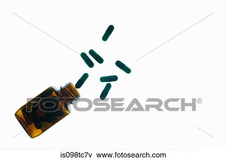 Medicine bottle and capsules View Large Photo Image Stock Photo - Medicine bottle and capsules. Fotosearch