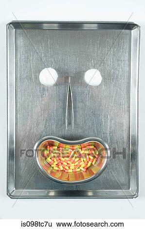 Surgical equipment made into a face View Large Photo Image Stock Photograph - Surgical equipment made into a face. Fotosearch