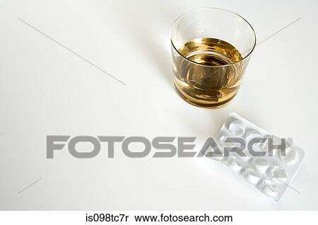 Whiskey and tablets View Large Photo Image Stock Photography - Whiskey and tablets. Fotosearch