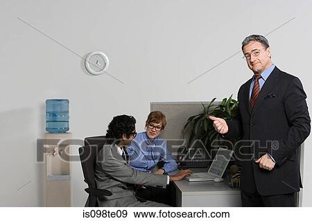 Stock Photo - Boss pointing to businesspeople. Fotosearch