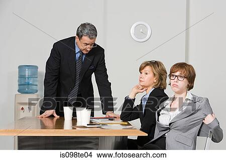 Boss talking to businesspeople View Large Photo Image Picture - Boss talking to businesspeople. Fotosearch