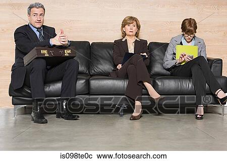 Stock Image - Business people waiting for job interview. Fotosearch