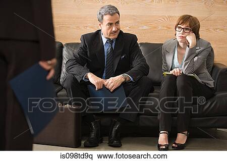 Business people waiting for job interview View Large Photo Image Stock Photography - Business people waiting for job interview. Fotosearch