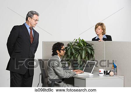 Businessman watching over work View Large Photo Image Stock Image - Businessman watching over work. Fotosearch