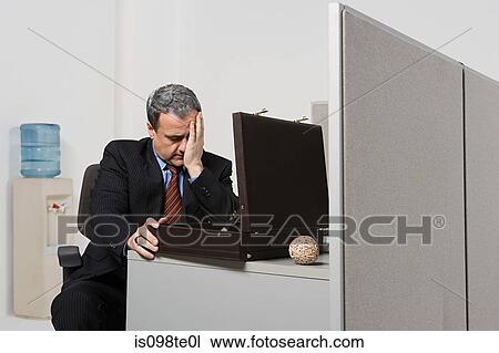 Businessman with head in hands View Large Photo Image Stock Image - Businessman with head in hands. Fotosearch