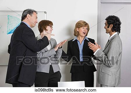 Stock Photograph - Businesspeople applauding. Fotosearch