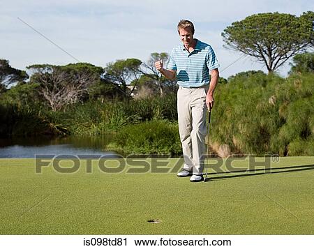 Ecstatic man playing golf View Large Photo Image Stock Image - Ecstatic man playing golf. Fotosearch