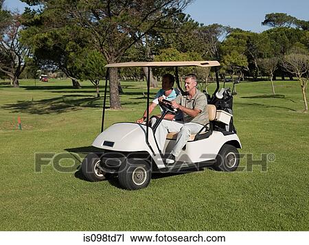 Two mature men in golf cart on golf course View Large Photo Image Stock Image - Two mature men in golf cart on golf course. Fotosearch