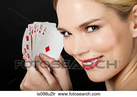 Young blonde woman playing cards View Large Photo Image Stock Photography - Young blonde woman playing cards. Fotosearch