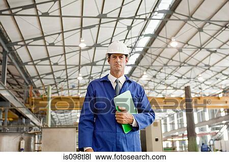 Mature man with clipboard in factory View Large Photo Image Stock Image - Mature man with clipboard in factory. Fotosearch