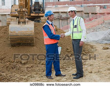 Mature men meeting on construction site View Large Photo Image Stock Image - Mature men meeting on construction site. Fotosearch