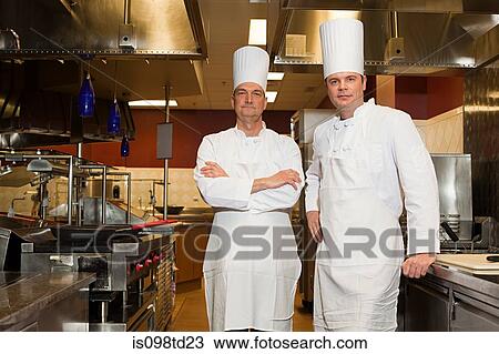 Chefs in commercial kitchen, portrait View Large Photo Image Stock Image - Chefs in commercial kitchen, portrait. Fotosearch