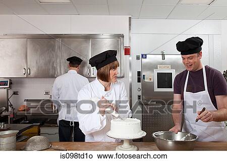 Making cake in commercial kitchen View Large Photo Image Picture - Making cake in commercial kitchen. Fotosearch