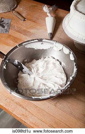 Making cake in commercial kitchen View Large Photo Image Stock Photograph - Making cake in commercial kitchen. Fotosearch