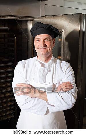 Male chef in commercial kitchen, portrait View Large Photo Image Stock Photo - Male chef in commercial kitchen, portrait. Fotosearch