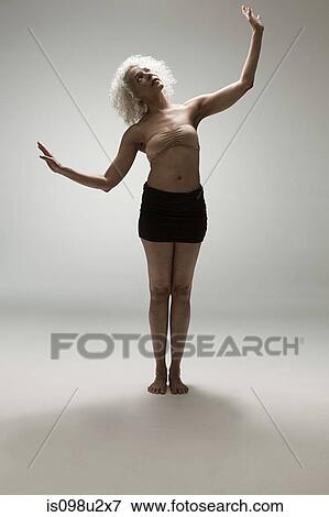 Mature woman stretching View Large Photo Image Stock Photo - Mature woman stretching. Fotosearch