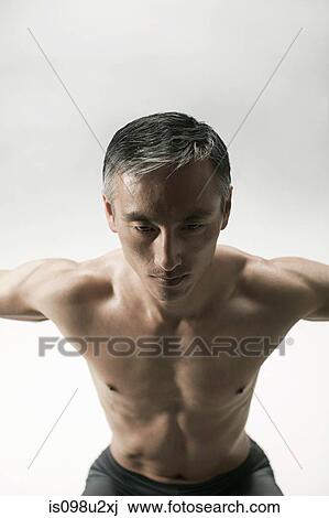 Muscular mature man, front view View Large Photo Image Stock Image - Muscular mature man, front view. Fotosearch