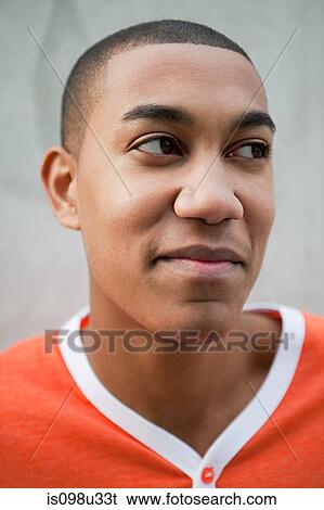 Portrait of a young man View Large Photo Image Stock Photograph - Portrait of a young man. Fotosearch