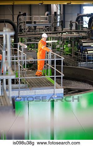 Stock Image - Engineer in factory. Fotosearch