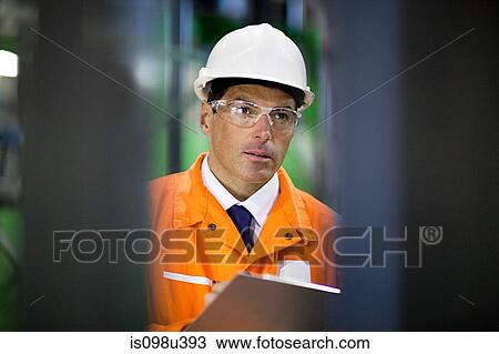 Engineer in factory View Large Photo Image Stock Image - Engineer in factory. Fotosearch