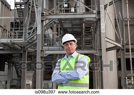 Engineer outside factory View Large Photo Image Stock Photo - Engineer outside factory. Fotosearch